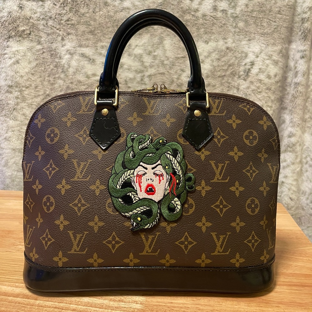 Authentic LV Alma with Medusa